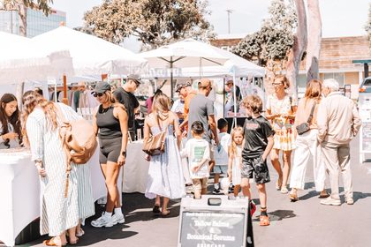 A curated vendor booth at a Dreamers Markets pop-up market