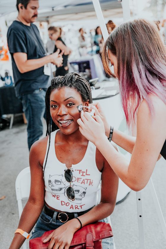 Face-painting moment at a Dreamers Markets booth